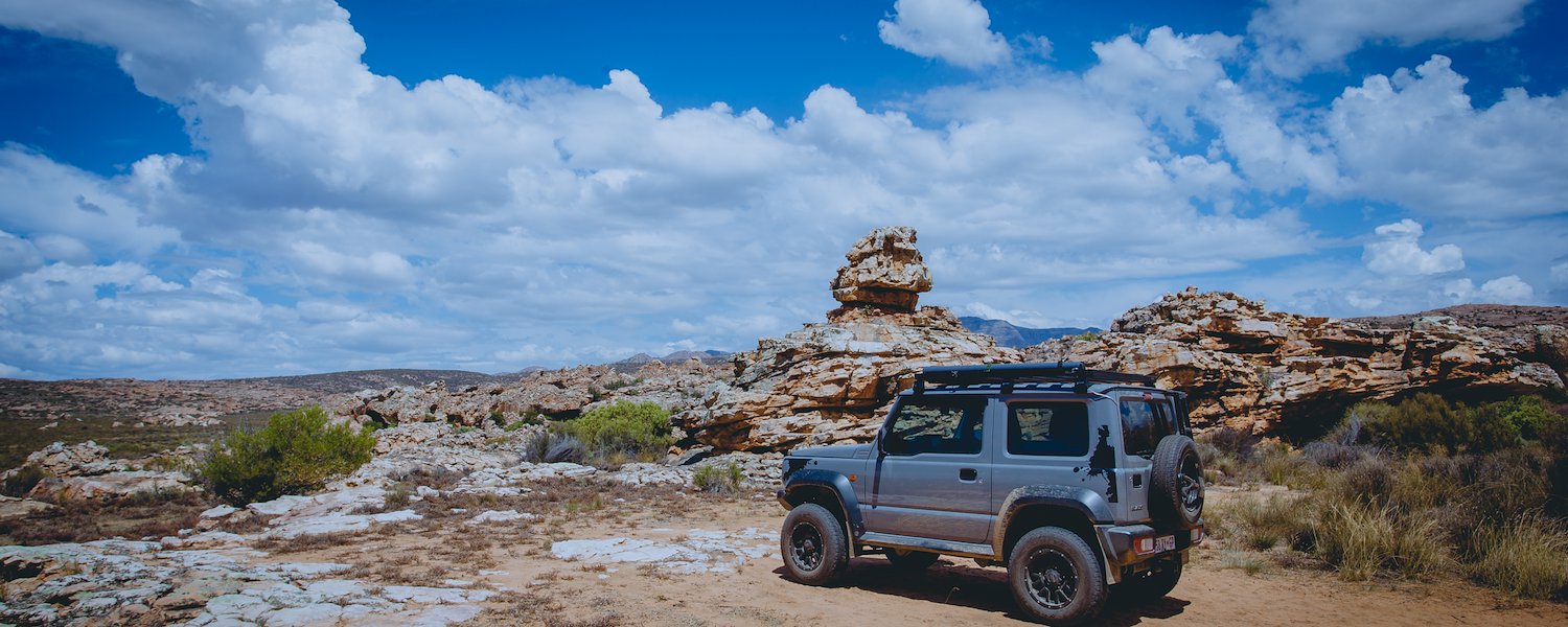 Grey Jimny exploring the Zoo Ridge mountains