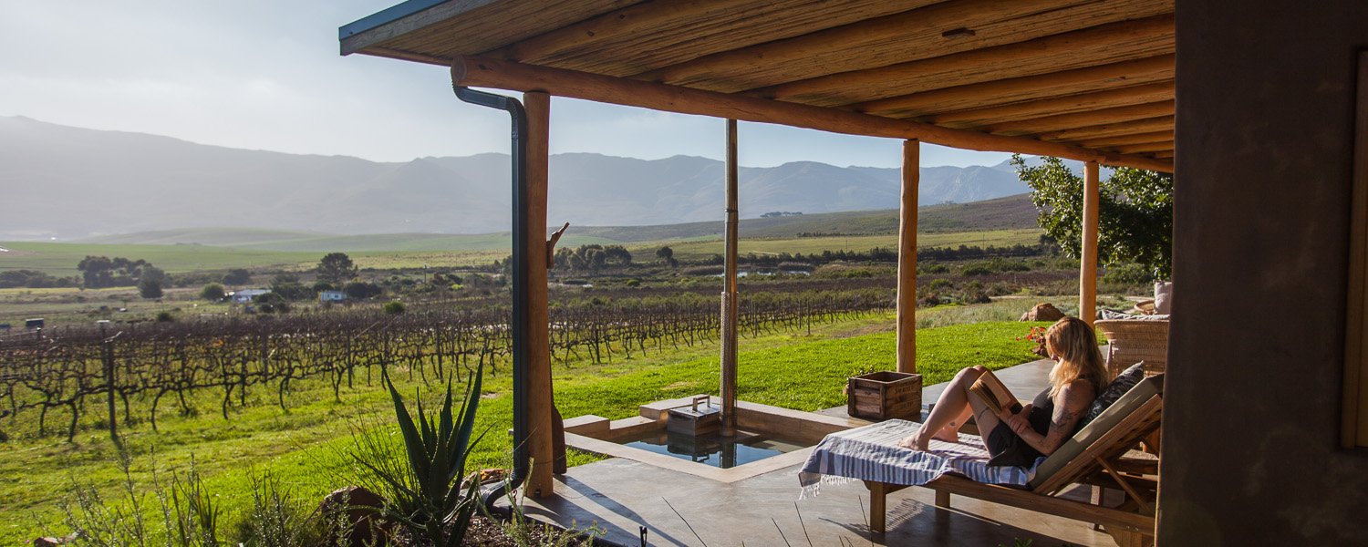 Enjoying a book with beautiful views over the vineyard