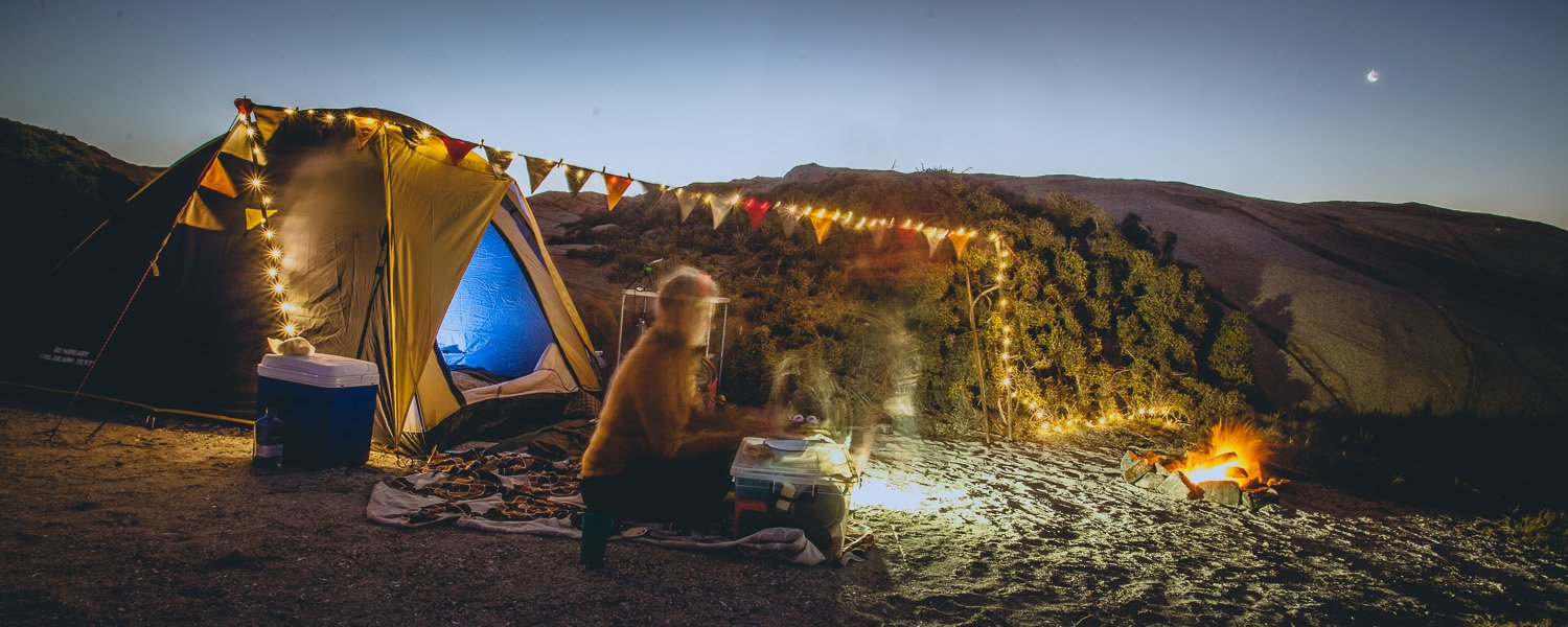 Camping along the rocky shoreline near Tietiesbaai